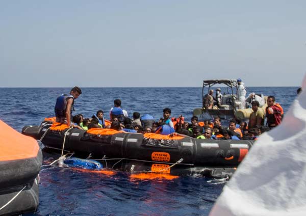 Migrant boat capsizes in Mediterranean, at least 25 dead