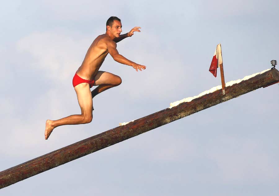 Gostra - Traditional Maltese game of running up a greasy pole