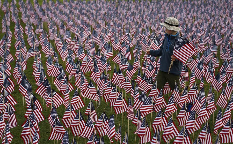 Americans mark the 14th anniversary of 9/11 attacks