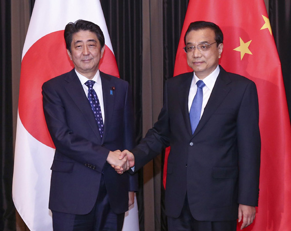 Deal with history responsibly, Li urges Abe