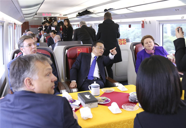 Premier Li and CEE leaders take high-speed train ride