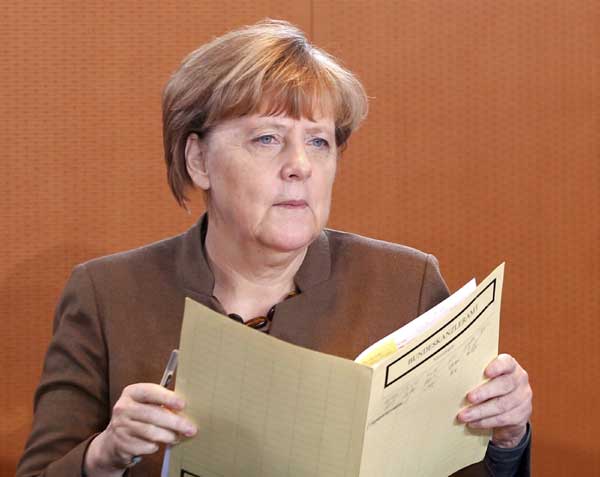 Merkel refuses cap on number of refugees