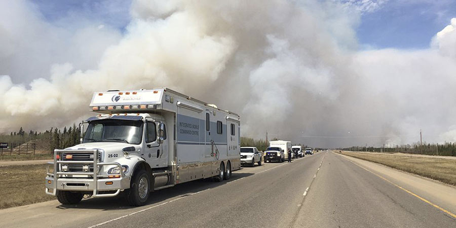 Raging wildfire spreads to more areas in west Canada