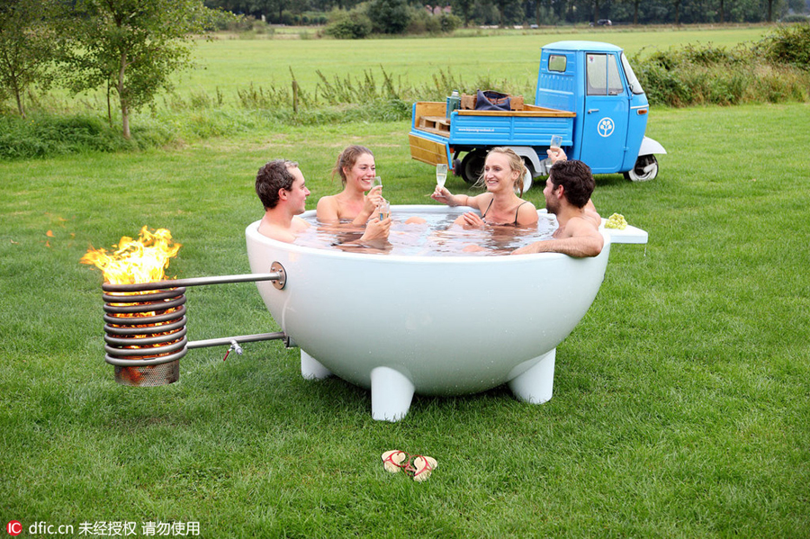 Enjoy outdoor bathing in portable hot tub
