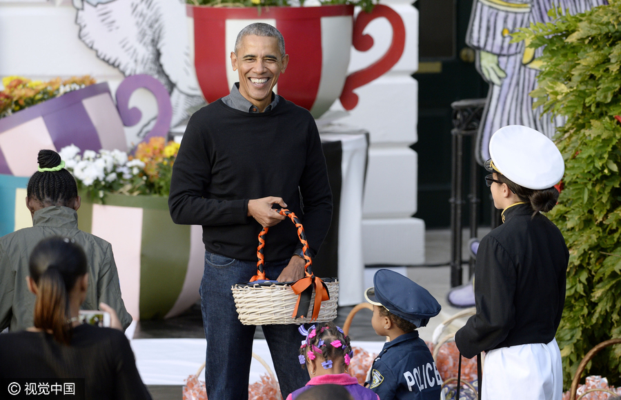 Obamas host White House Halloween for children