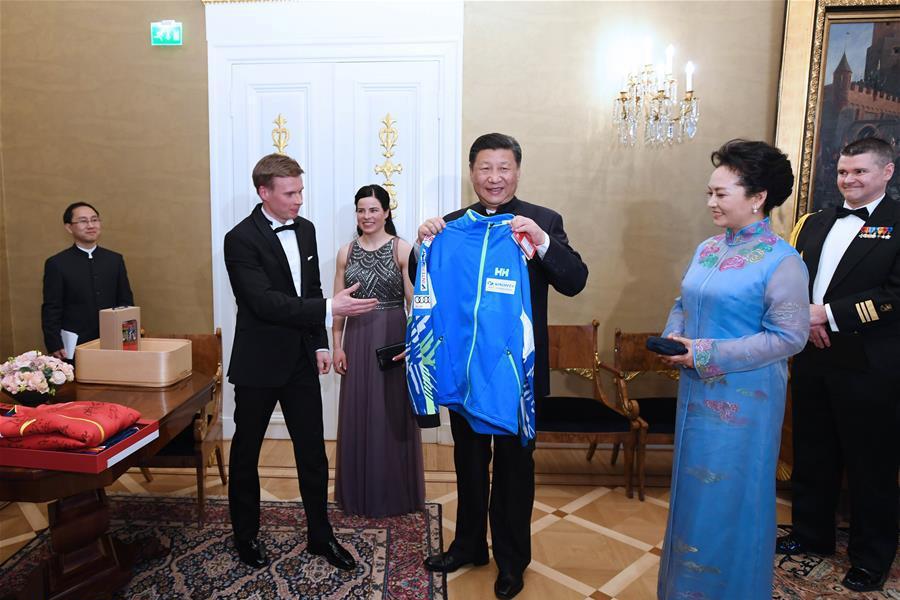 Chinese, Finnish presidents meet winter sports athletes