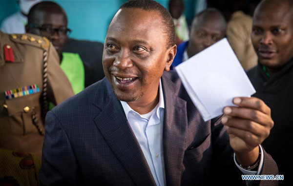 Kenya's Kenyatta wins re-election, pledges to unite nation