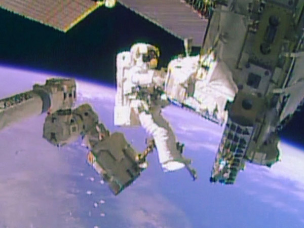 NASA astronauts have a Christmas Eve spacewalk
