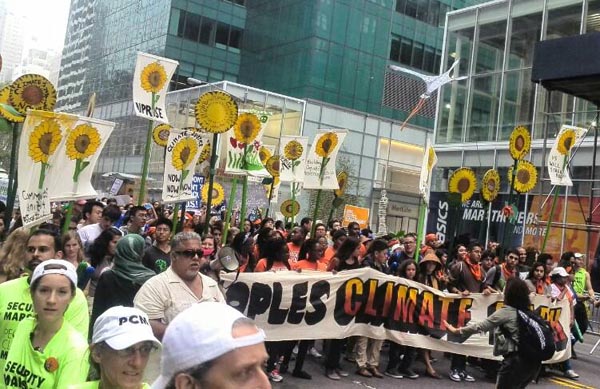 Tens of thousands crowd New York streets for climate march
